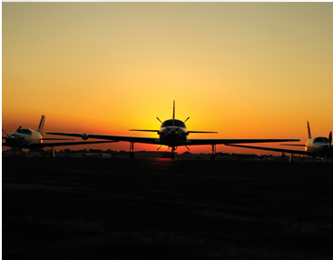 Piper Aircraft M class model with a sunset