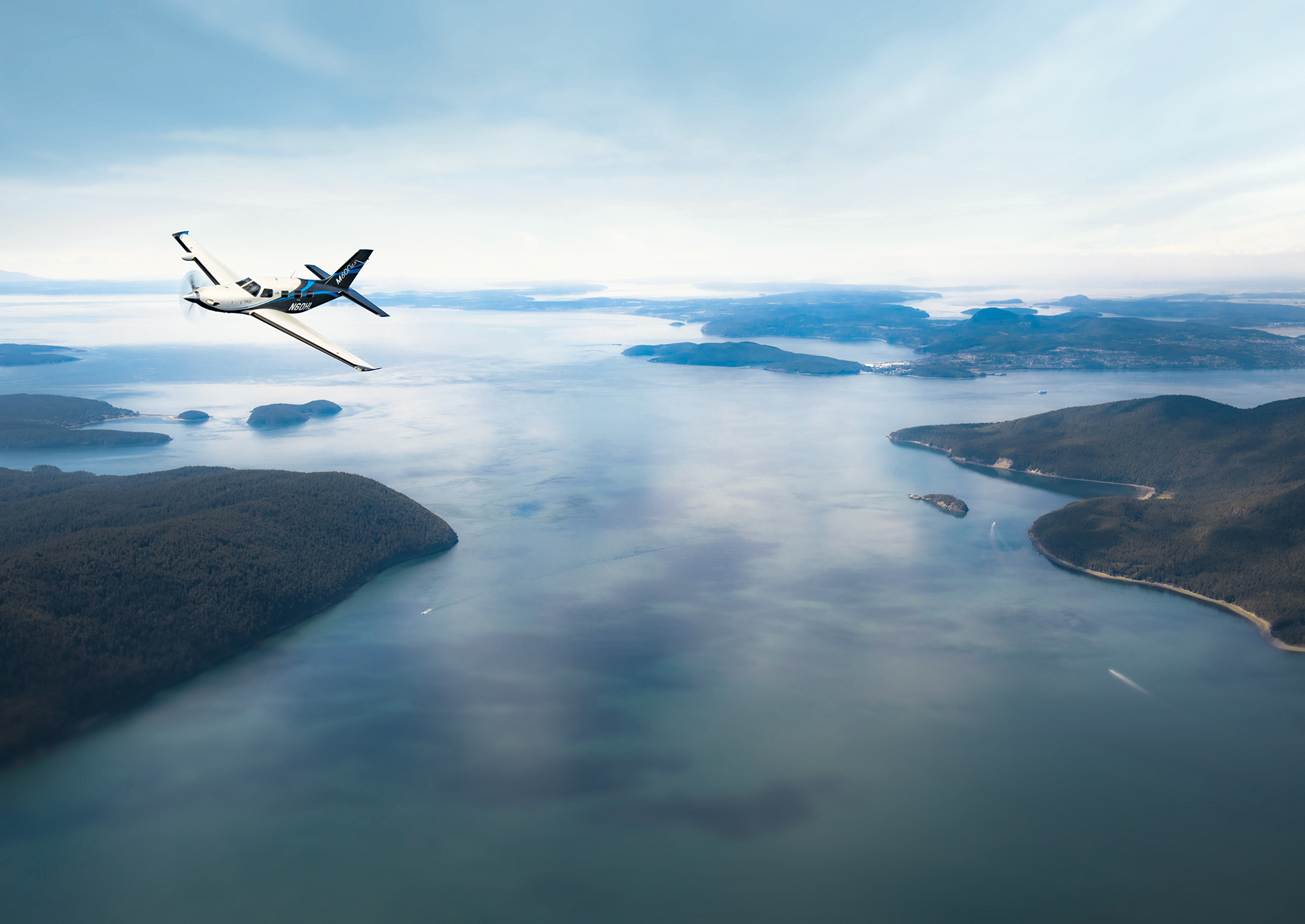 M600SLS flying over water and land