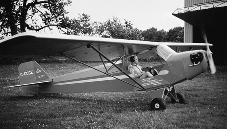 A pilot prepares to take off in a Taylor E-2 Cub [Photo courtesy of the Canada Air and Space Museum]