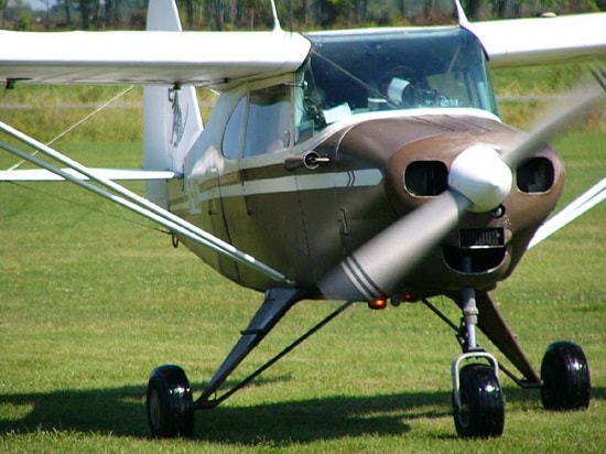 A Piper PA-22-135 Tri Pacer preparing for takeoff.