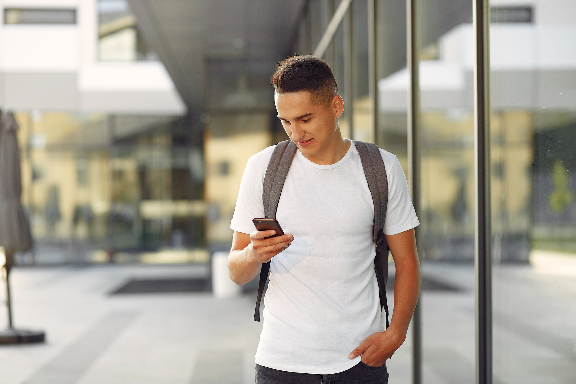 A student checking his phone