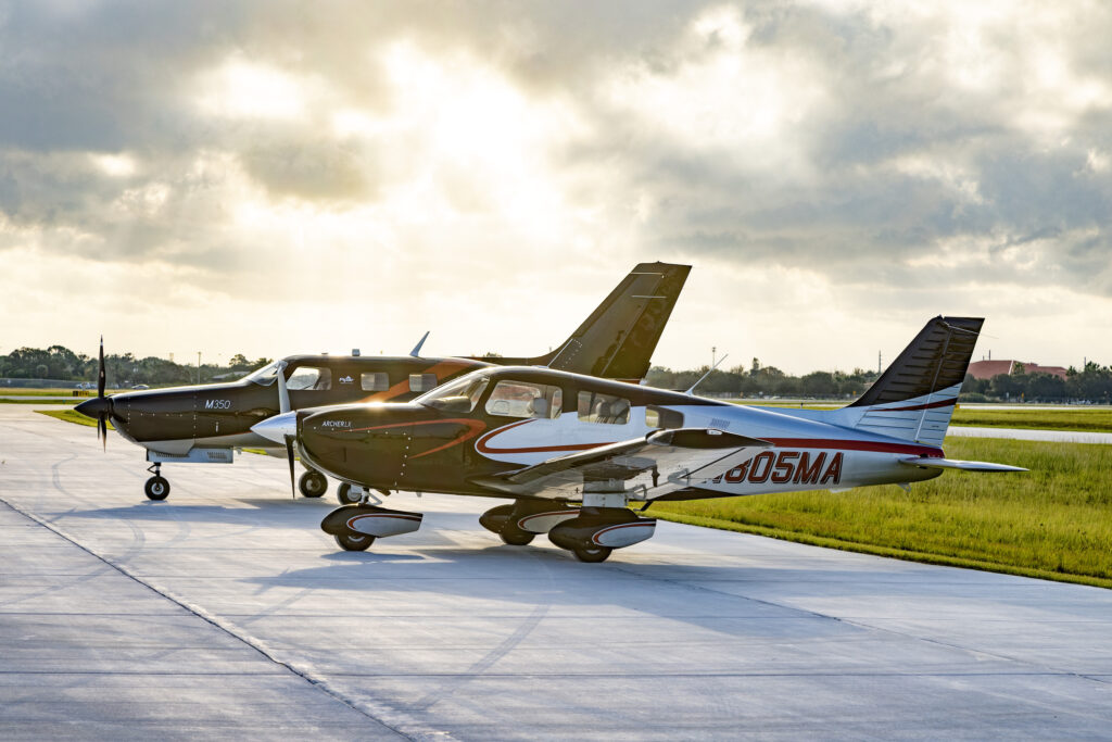 Piper Aircraft M350 and Archer LX side by side on a runway