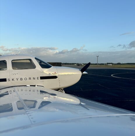 A side view of a front of a plane