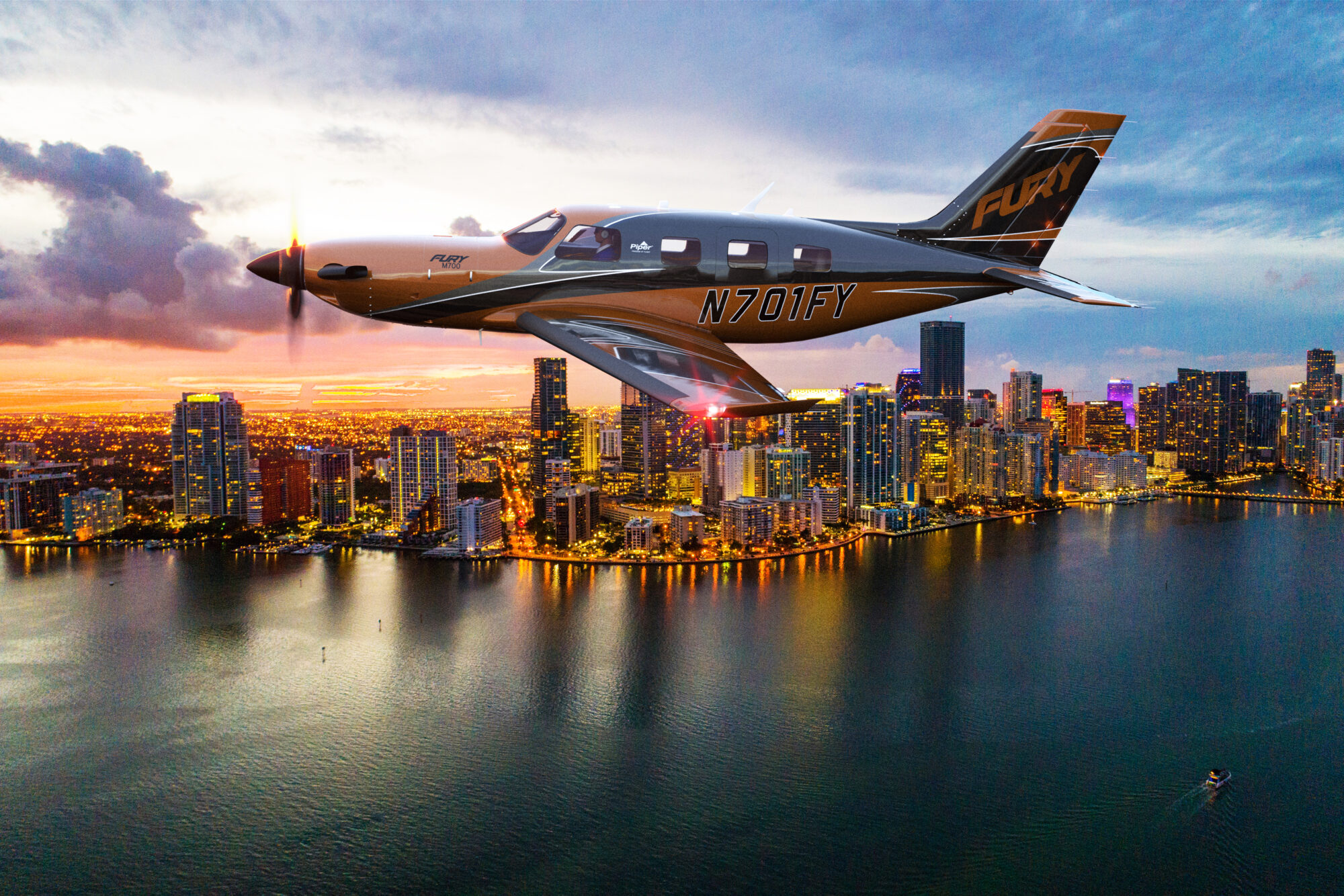 A Plane flying across the water with a city in the background.