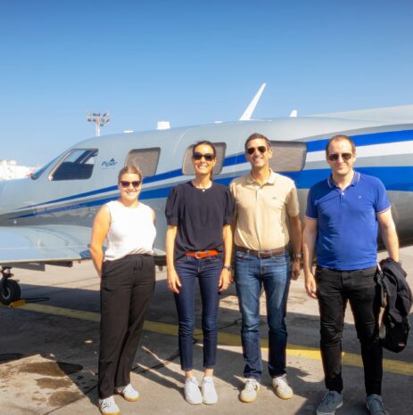 Piper Hosts First-Ever European Fly-In in Slovenia 6 Four Piper European Fly-In attendees stand in front of a blue-and-silver Piper M700 Fury at Portorož Airport.